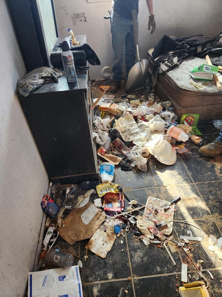 Extreme clutter and debris in a property after an eviction.